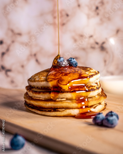 blackberry hotcakes covered in syrup