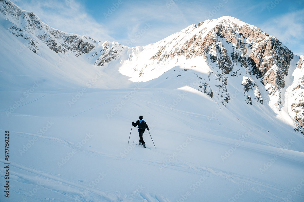 Ski tour in a beautiful winter landscape. Ski mountaineering. Mountains covered with snow 