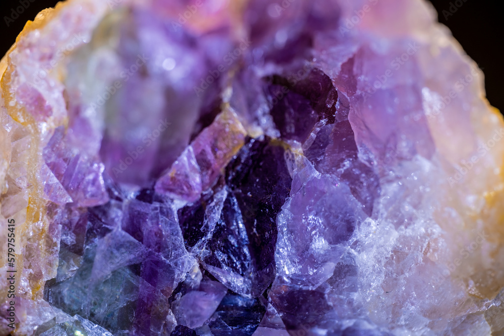 Crystals of the mineral Amethyst close-up. Crystals of the mineral Amethyst close-up.
