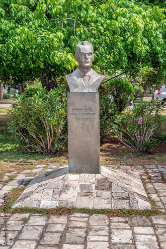 Budva, Montenegro - June 17, 2021: Bust of Marko F. Stanisic in the park on Slovenian coast in Budva, vertical. Monument to the national hero by Stevan Luketic, 1985 photo