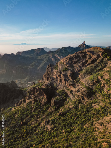 Aerial View of Mountains with Roque Nublo and Mount Teide in the Background in Gran Canaria, Spain
