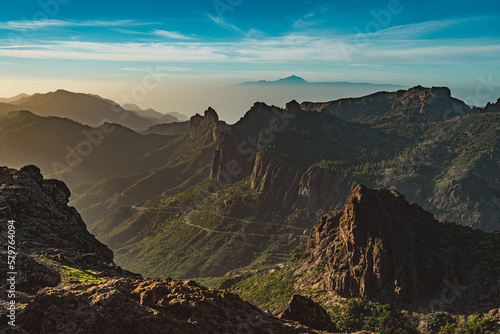 View of Rocky Ravine with Tenerife in the Background in Gran Canaria, Spain © Nelida Zubia
