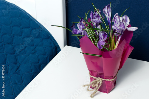 Crocus flowers on the table in the bedroom