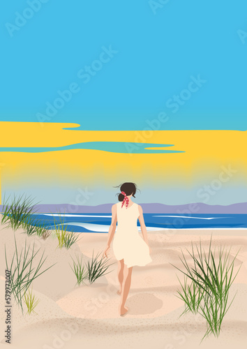Femme de dos avec une robe blanche se promenant sur la plage face à la mer