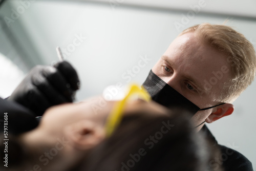 Dentistry female patient at a doctor's appointment for an oral cavity examination with caries