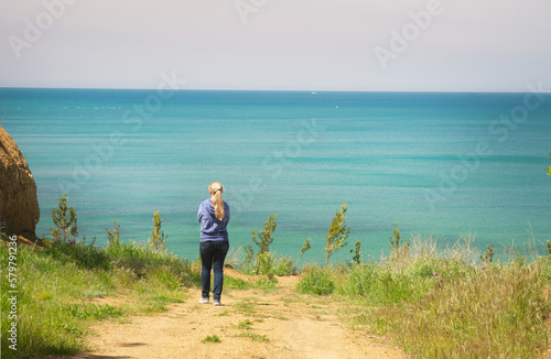 Woman on the seashore.