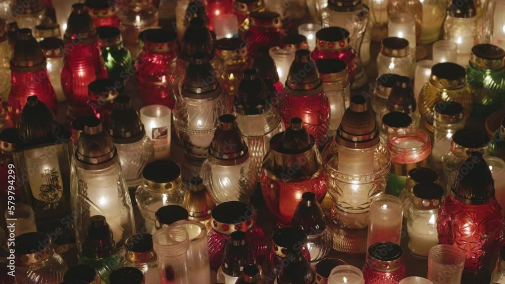 Decorative votive candles during All Saints Day at the cemetery. Decorative votive candles during All Saints Day at the cemetery.