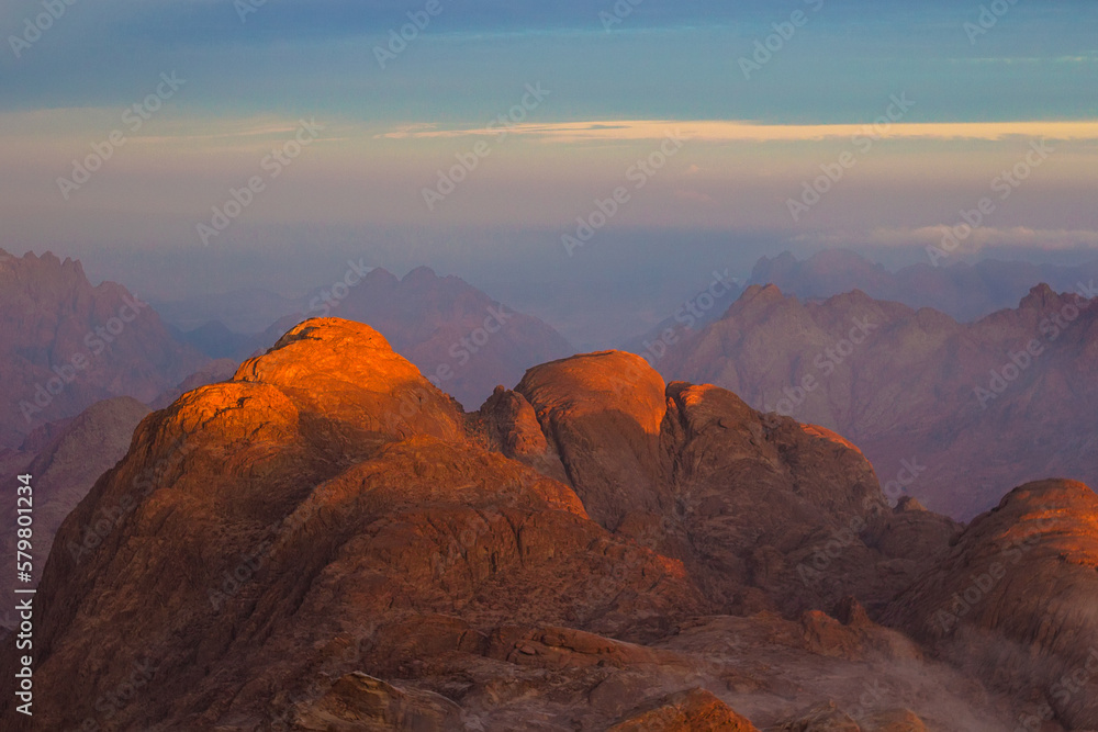 Sunrise seen from the Mount Moses (Mount Sinai). Beautiful mountain scenery in Egypt, Sinai peninsula, North Africa