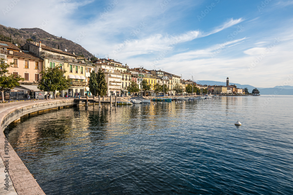The beautiful lakeside of Salò with the Lake Garda and the Monte Baldo in background
