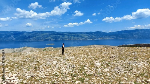 person on a meadow mountain