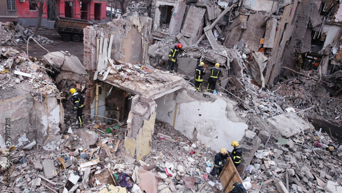 Kiev, Ukraine - 08 March 2023: Aerial view of bombed residential building with snow in winter during the war between Russia and Ukraine.