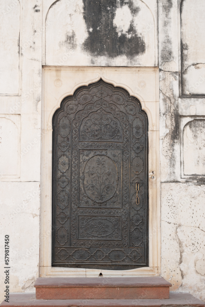 Vintage door at red fort new delhi, india