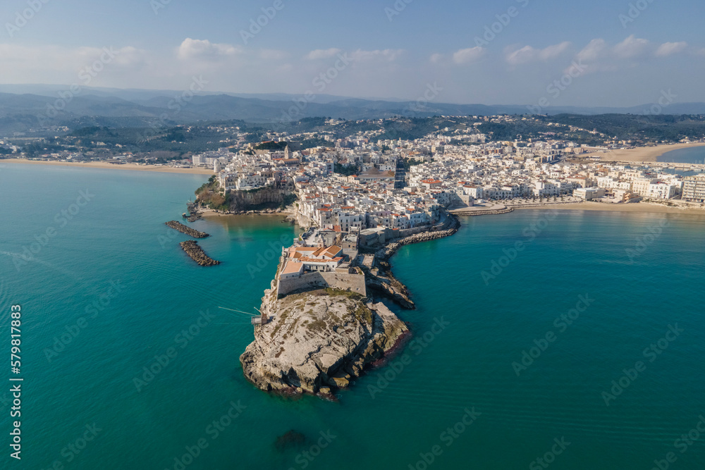 Aerial view of Vieste, a small town along the coast in the Gargano Natural Park, Foggia, Puglia, Italy. Aerial view of Vieste, a small town along the coast in the Gargano Natural Park, Foggia, Puglia, Italy.