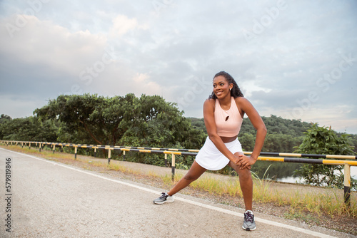 woman running on the road