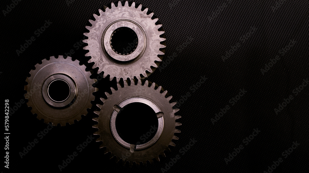 gears on black background gears on black background