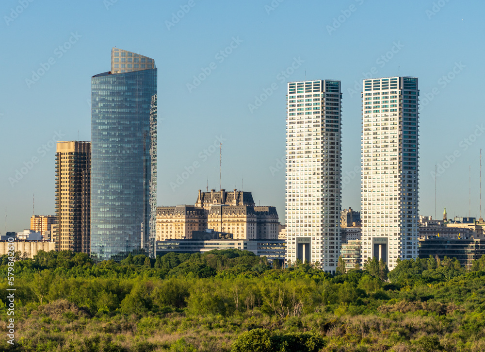 Fototapeta premium Large modern apartment buildings of Puerto Madero by the shoreline in Buenos Aires Argentina