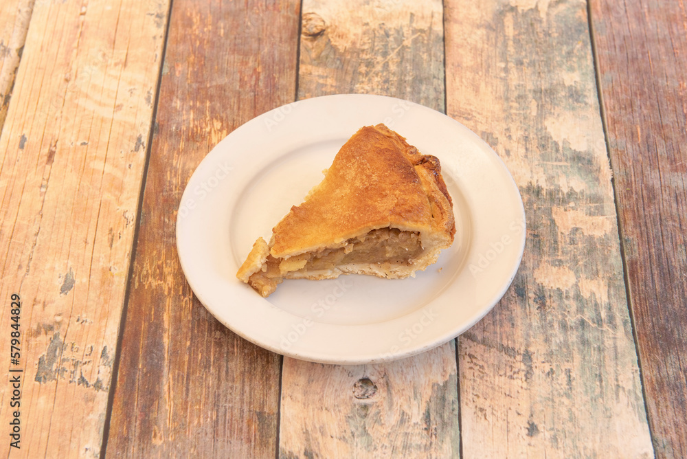 Apple pie is a fruit pie. There are many variants, and the apple can be sliced or in compote. Apples can be placed directly on top of the dough or on a cream base Apple pie is a fruit pie. There are many variants, and the apple can be sliced or in compote. Apples can be placed directly on top of the dough or on a cream base