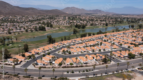 Aerial view of a sprawling neighborhood of family homes in Menifee, California, USA.