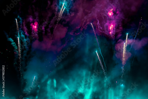 Fireworks in the sky with a purple background