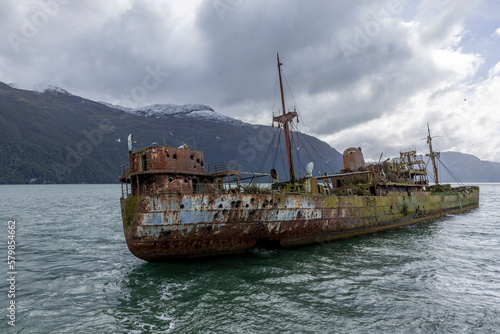 Wreck of MV Captain Leonidas, a freighter that ran aground on the Bajo Cotopaxi (Cotopaxi Bank) in 1968 – viewed from a ferry passing the Messier Channel in Patagonia, Chile  © freedom_wanted