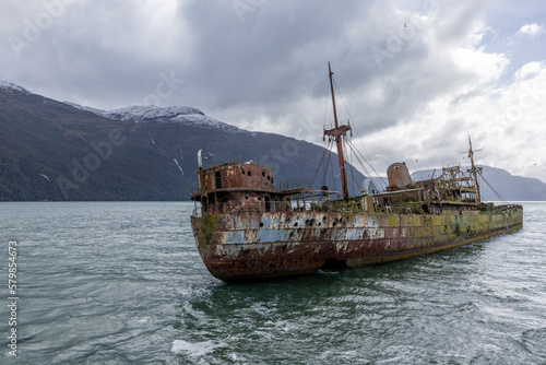 Wreck of MV Captain Leonidas, a freighter that ran aground on the Bajo Cotopaxi (Cotopaxi Bank) in 1968 – viewed from a ferry passing the Messier Channel in Patagonia, Chile  © freedom_wanted