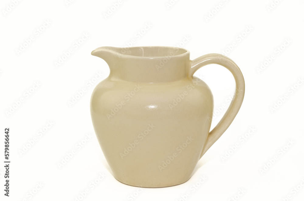 White antique pottery pitcher isolated on white background White antique pottery pitcher isolated on white background