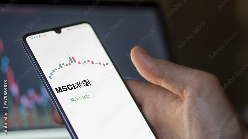 Investor analyzing an ETF. Funds stocks exchange ETFs Japanese text: msci usa, buy. MSCI米国 証券取引所 投資 shares Investor analyzing an ETF. Funds stocks exchange ETFs Japanese text: msci usa, buy. MSCI米国 証券取引所 投資 shares