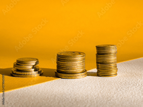 stacks of coins. golden stacks of coins in ascending order