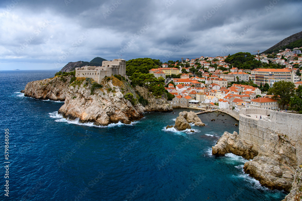 Aerial view of Lovrijenac Fortress, city walls and Kolorina beach, Dubrovnik, Croatia