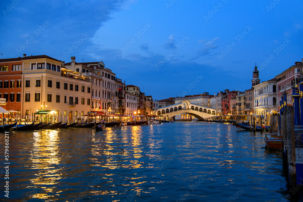 Venice, Italy: Grand Canal at evening in the background with Rialto Bridge, blue hour