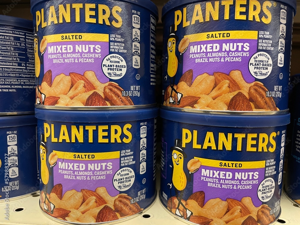 Grocery store Planters peanuts canisters salted mixed nuts Stock Photo