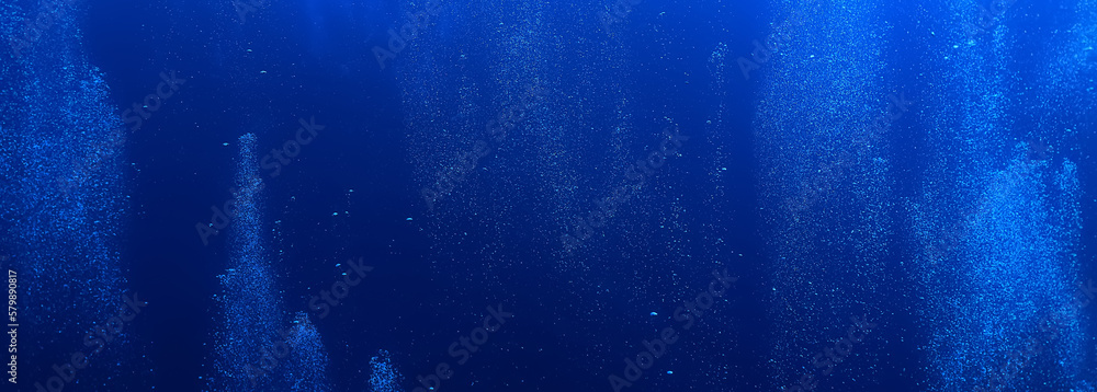 Naklejka premium bubbles under water diving background