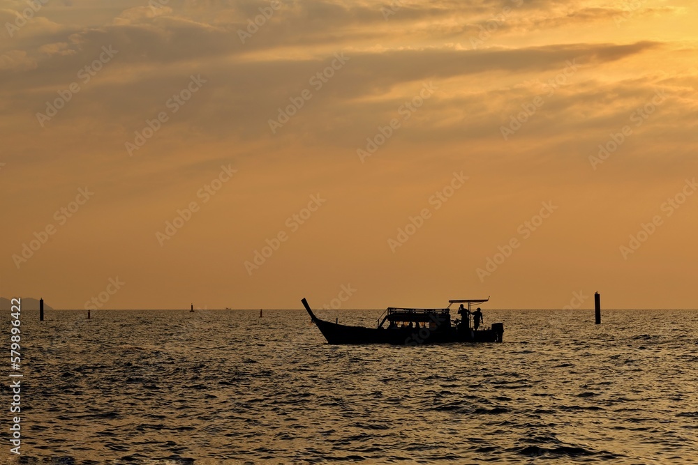 Passenger boat returning from a sunset tour