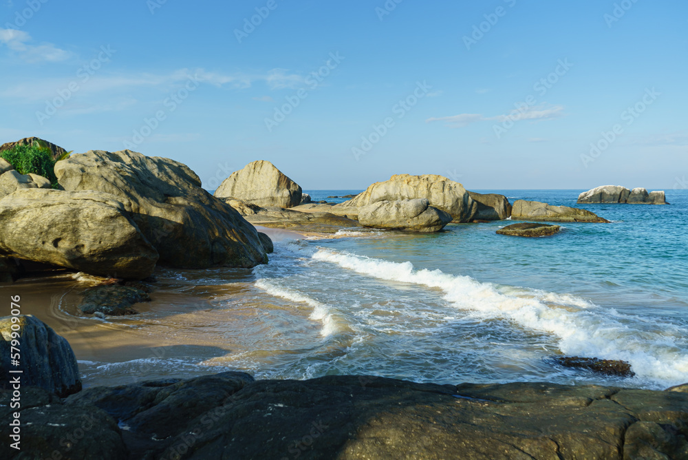 Landscape sandy bay among the rocks