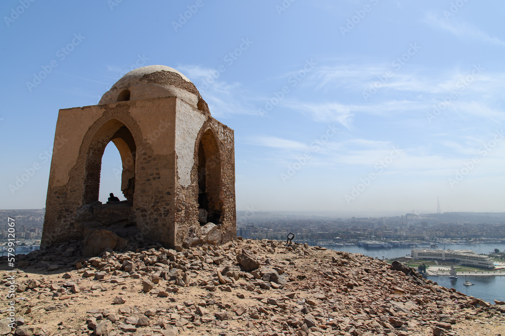 Ancient El Hawa dome (Qubbet Elhawa) on top of Aswan with a view of the city in the background