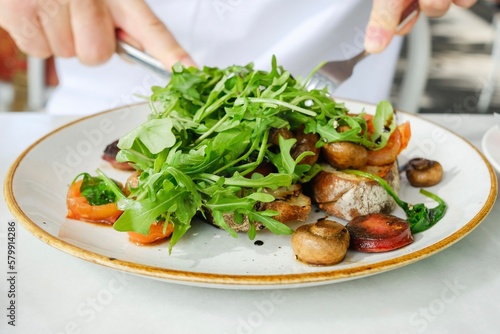 Wallpaper Mural A plate of chorizo, caramelised onions and mushrooms, fresh arugula (baby rocket) on toasted sourdough at a cafe in Cairns City — Far North Queensland, Australia Torontodigital.ca