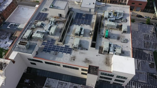 Aerial Drone Shot of PV Solar Install on Urban Buidling in City (Brooklyn, NY)