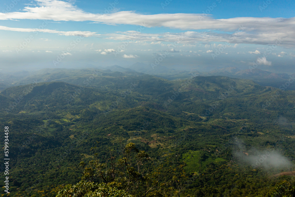 Mountains and green hills in Sri Lanka. Slopes of mountains with evergreen vegetation. Lipton's Seat.