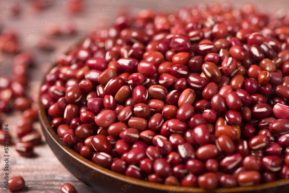 Azuki beans or red beans on wooden table Azuki beans or red beans on wooden table