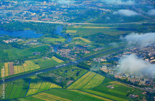 Aerial view over the fields of Holland. Crop fields aerial view.
