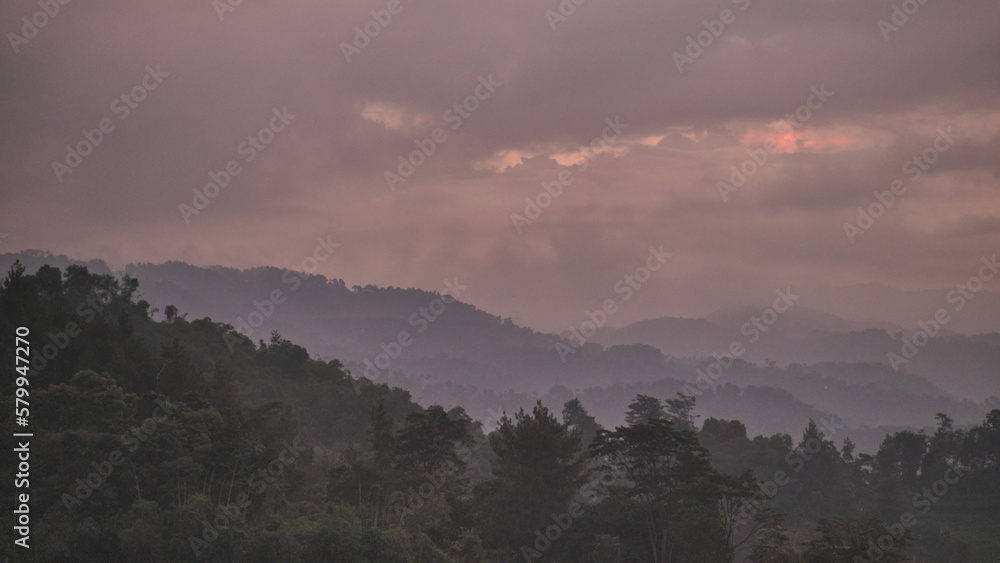 The Enchanting Beauty of an Evening Mountain View: Captured in a Yellow Sky Low-Light Photo