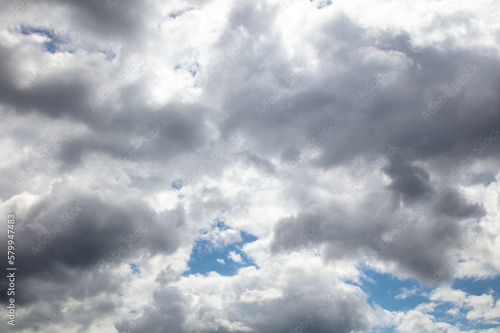 Fototapeta premium Thunderclouds on the blue sky