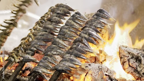 Sardines Fish Skewer Fire Grilled with Burning Firewood