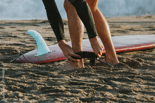 Surfer preparing for entering the ocean