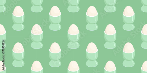 Seamless pattern with eggs in egg cups - vector illustration.