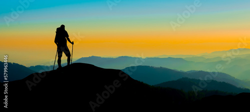 Silhouette of hikers mountains forest woods in the morning, landscape panorama, hike hiking adventure travel background