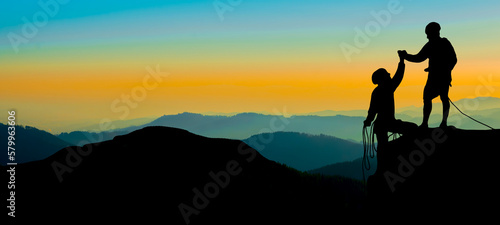 Climb climber adventure panorama background banner - Black silhouette of climbers on a cliff rock with mountains landscape and sunset sunrise