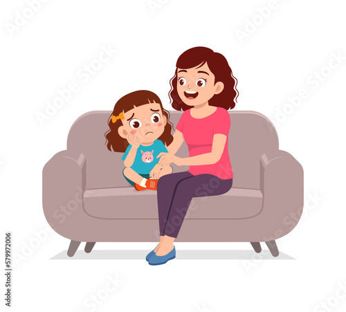 mother try to console sad little kid