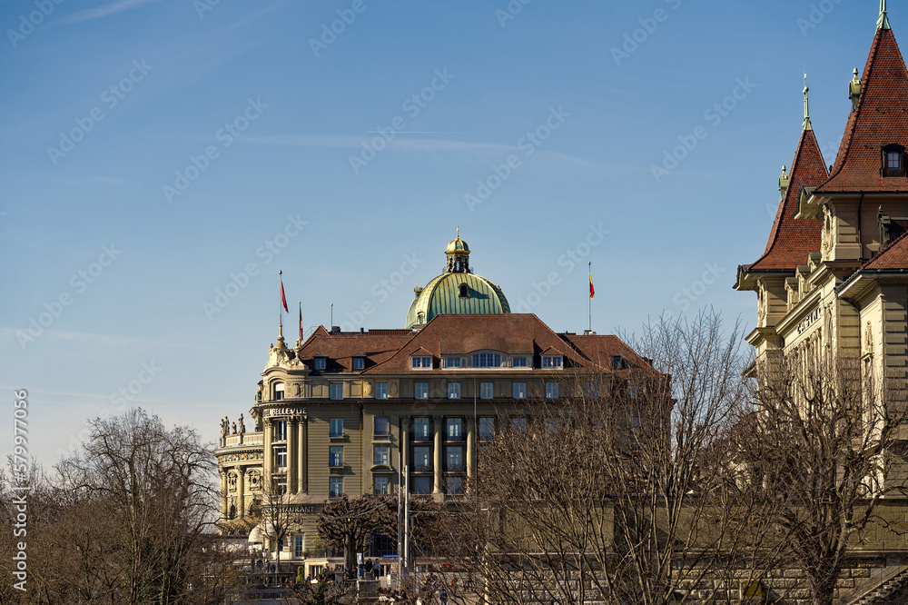 Scenic view of historic houses at the old town seen from Minster Terrace at the Swiss City of Bern on a sunny winter day. Photo taken February 21st, 2023, Bern, Switzerland.