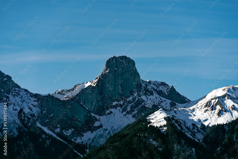 Panoramic landscape with Stockhorn peak seen from City of Thun on a sunny winter day. Photo taken February 21st, 2023, Thun, Switzerland.